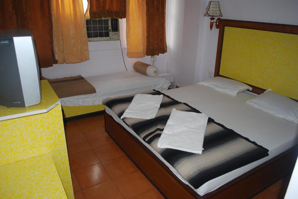 Charans Guest House Lucknow Rum bild