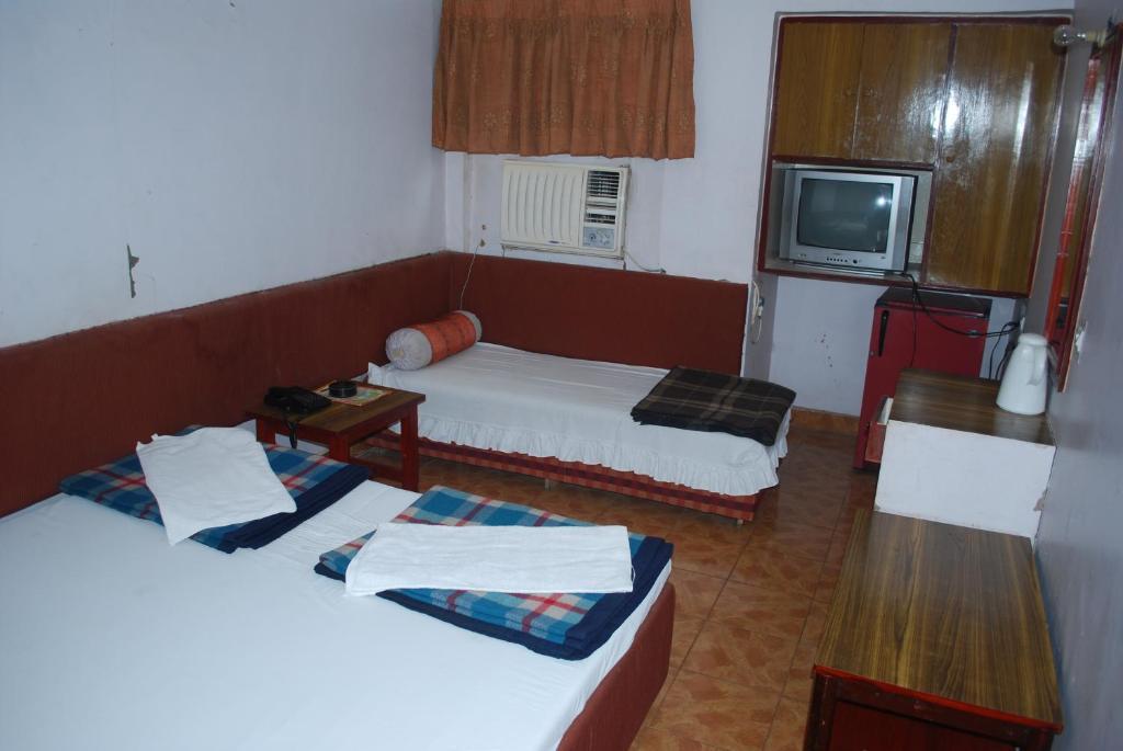 Charans Guest House Lucknow Rum bild